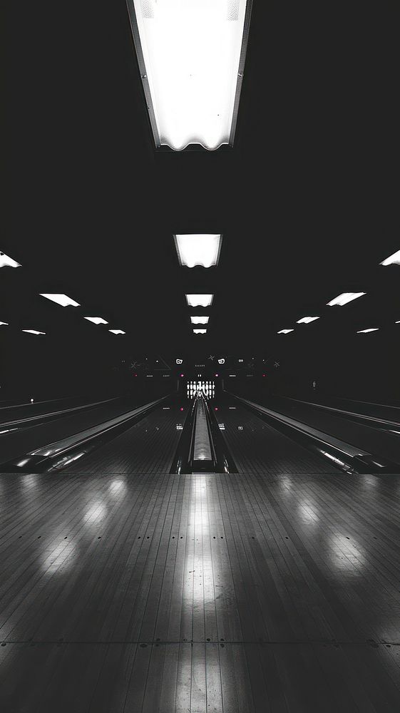 Photography of bowling court lighting black white.