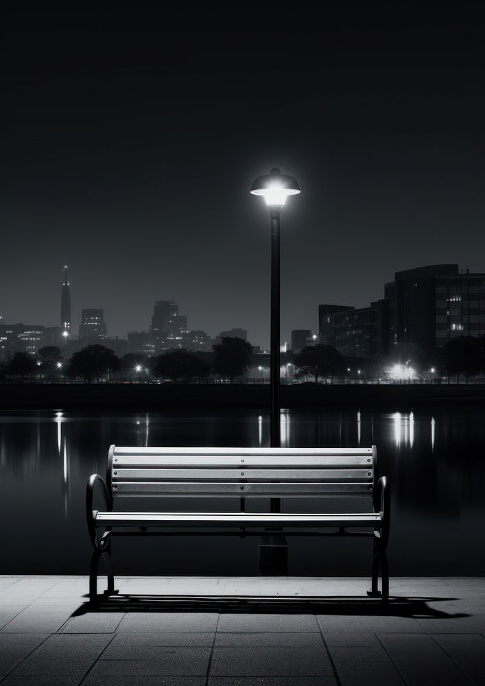 Photography of riverside bench black architecture.
