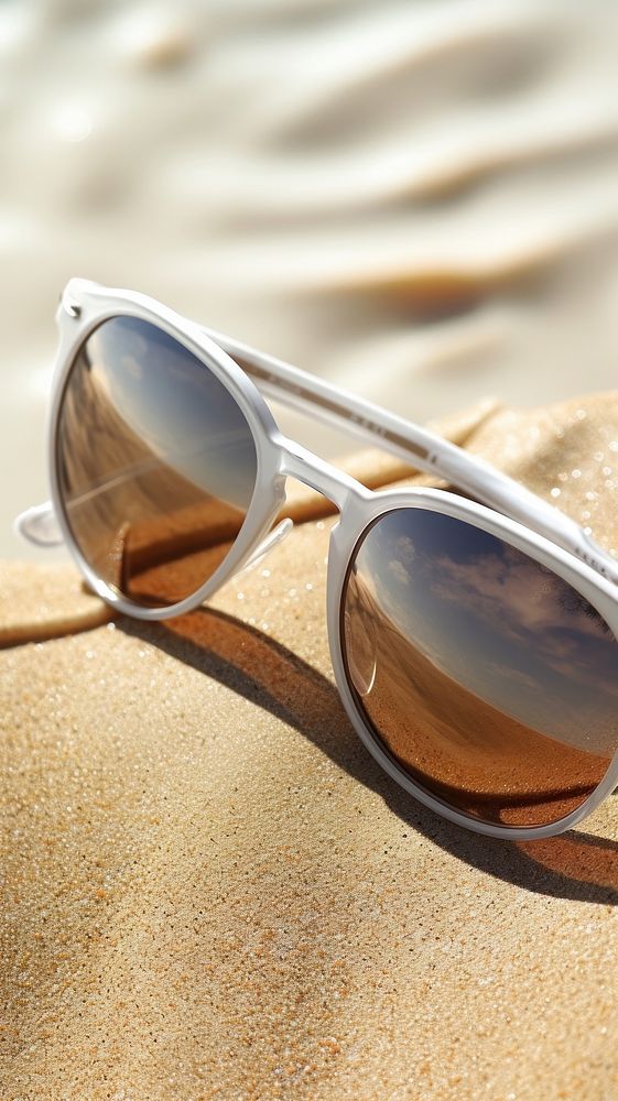 Beach sunglasses summer sand.