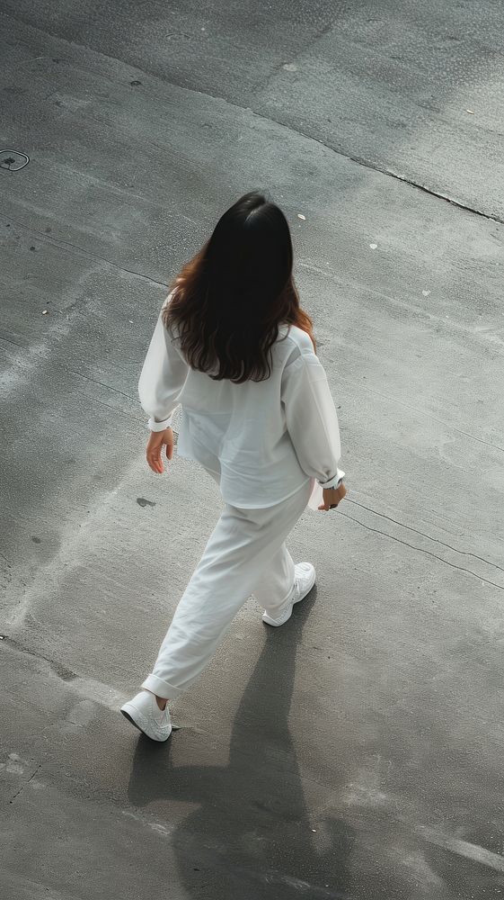Asian woman person walking footwear architecture pedestrian.