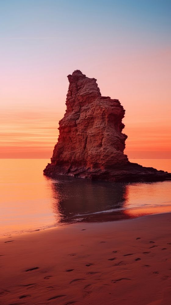  Rock formation nature sunset beach rock. AI generated Image by rawpixel.
