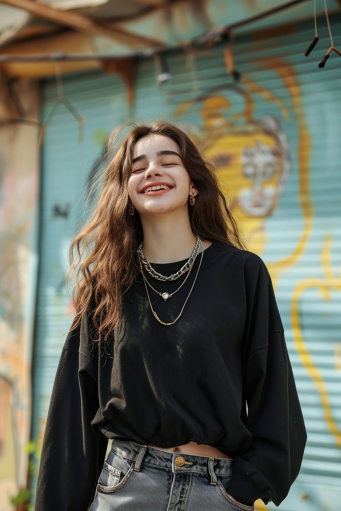 Middle eastern teenager girl necklace blouse smile.