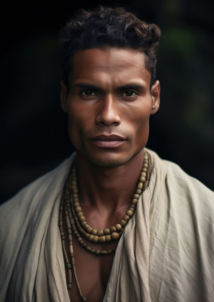 A Micronesian male in traditional cloth portrait necklace jewelry.