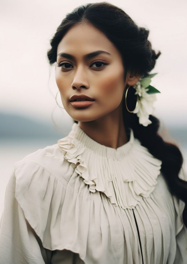 A Pacific Islander woman in traditional clothe portrait adult photo.