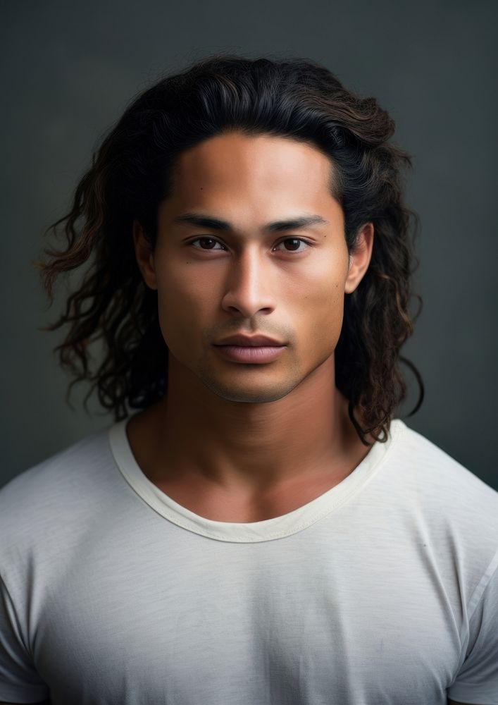 A Pacific Islander male with original hair style portrait adult photo.