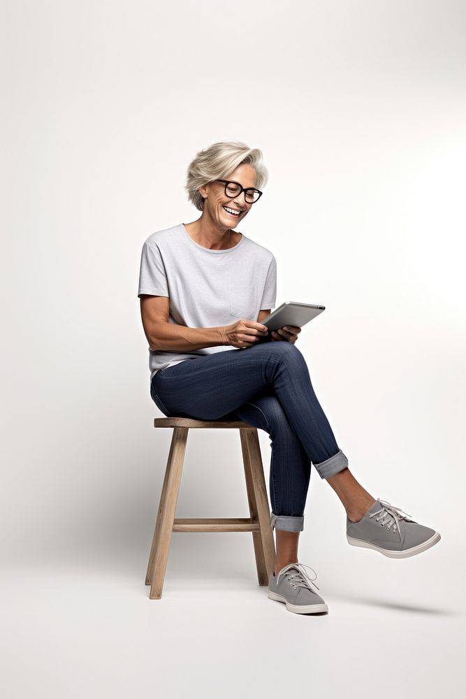 Senior short hair woman wear glasses footwear sitting adult. 