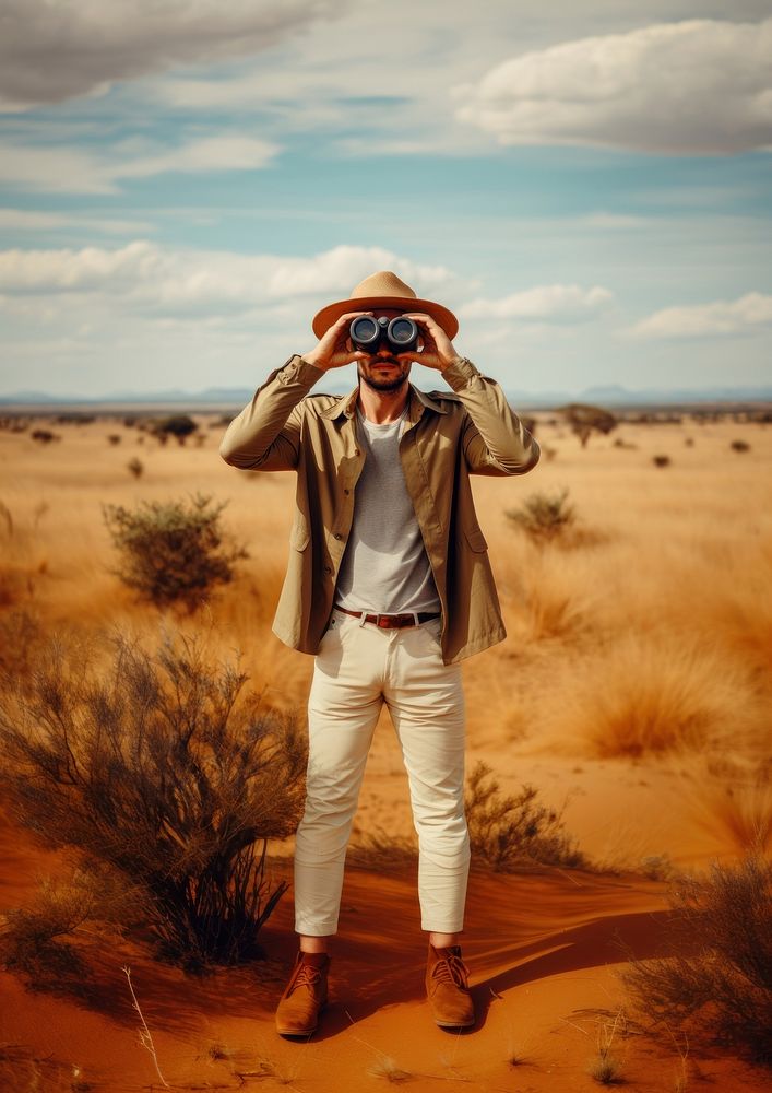 Man using Binoculars binoculars sunglasses outdoors. AI generated Image by rawpixel.