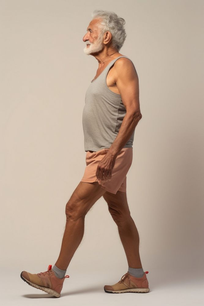 A Mexican senior man footwear shorts person.