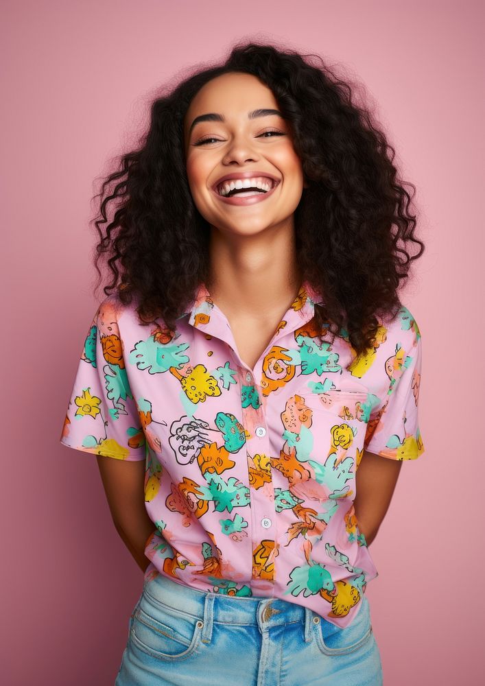 Young African American woman stands smile laughing pattern.