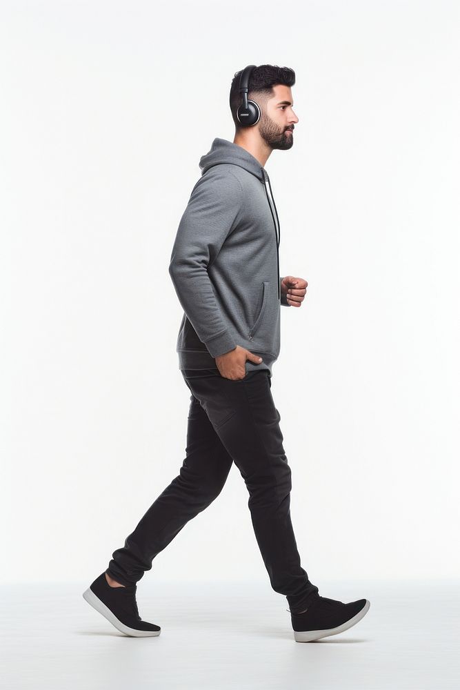 Male walking headphones footwear standing.