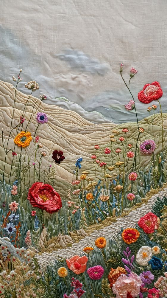 Embroidery with meadow flowers needlework landscape textile.