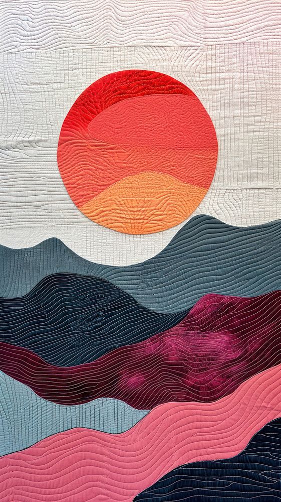 Embroidery with sunset textile craft quilt.