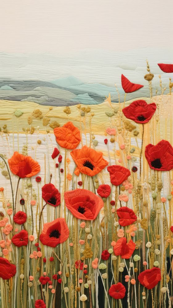 Embroidery is shown poppy landscape painting.