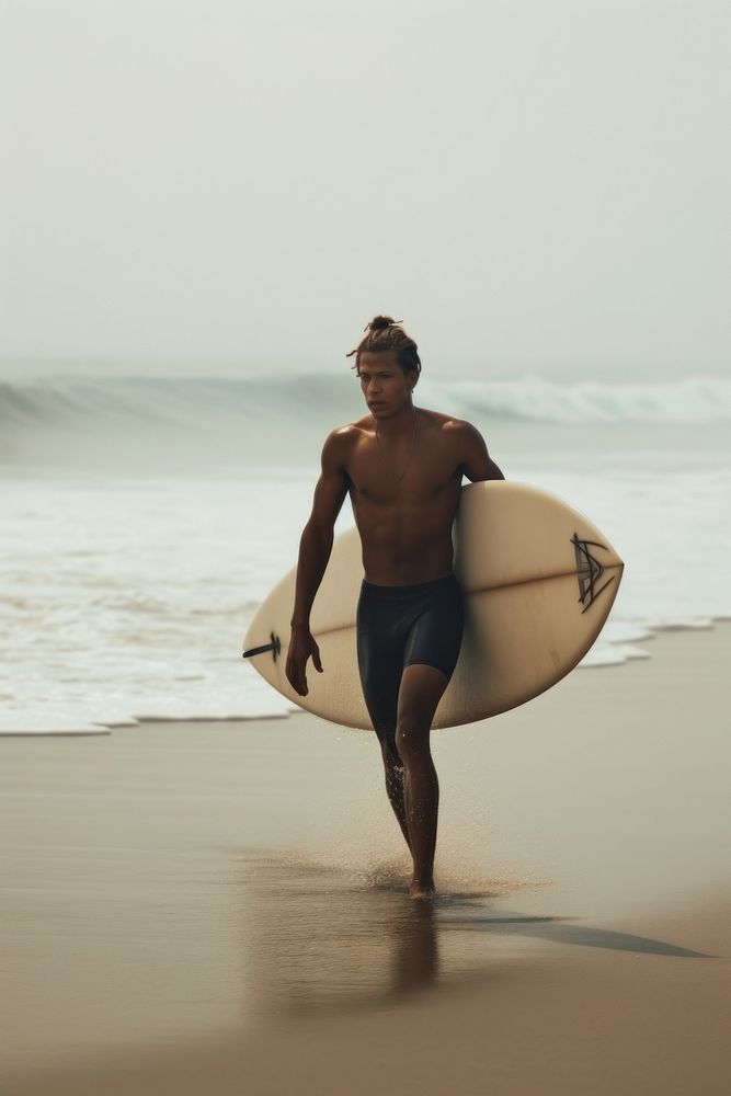 Affrican american male surfboard outdoors surfing.