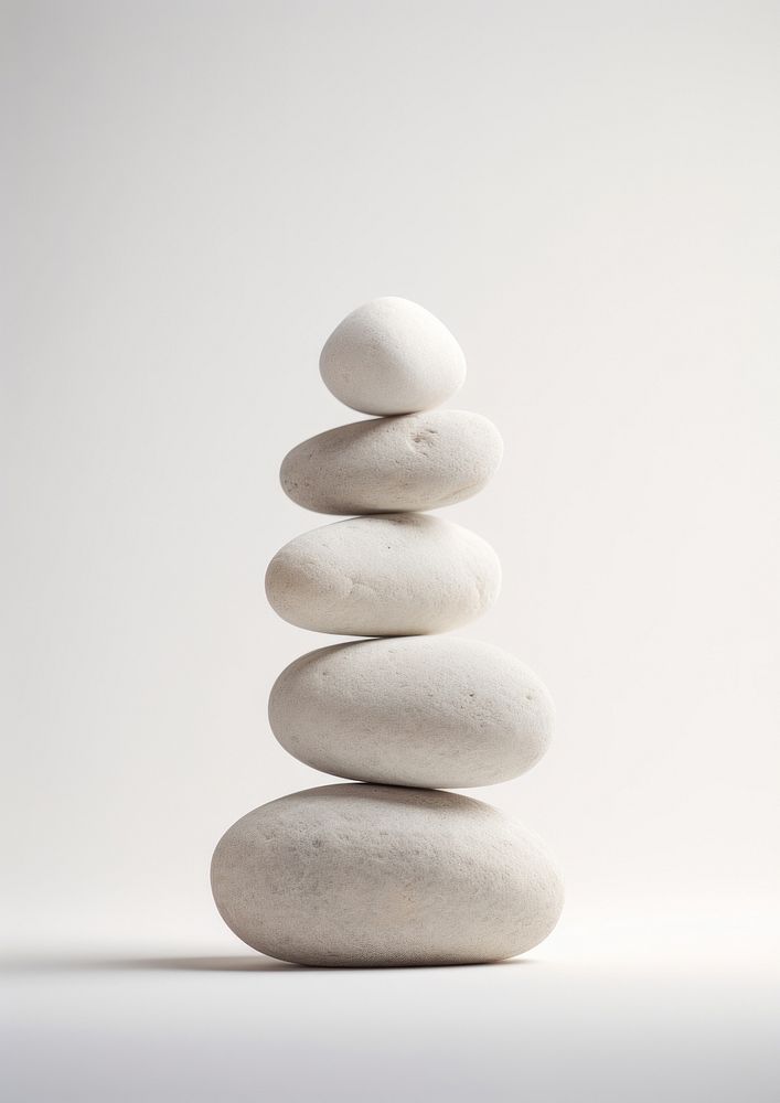  Minimal rocks sitting on top of a white surface pebble simplicity zen-like. AI generated Image by rawpixel.