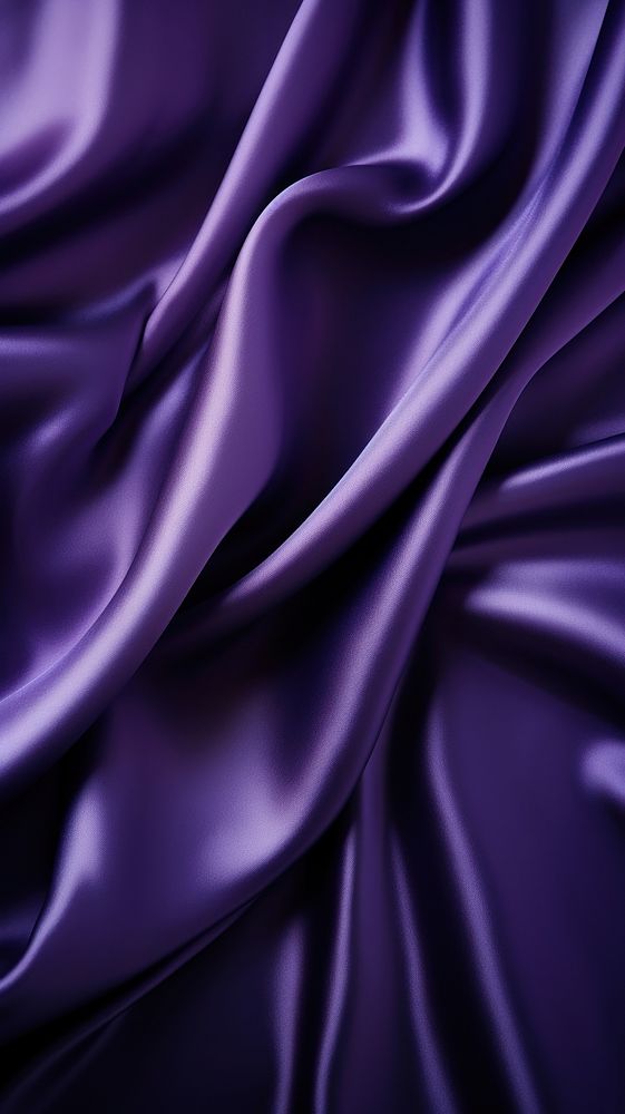  A darkpurple satin fabric backgrounds blue silk. AI generated Image by rawpixel.