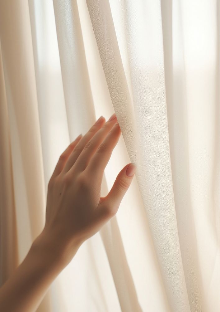  A person reaching out of a beige curtain backgrounds finger hand. AI generated Image by rawpixel.