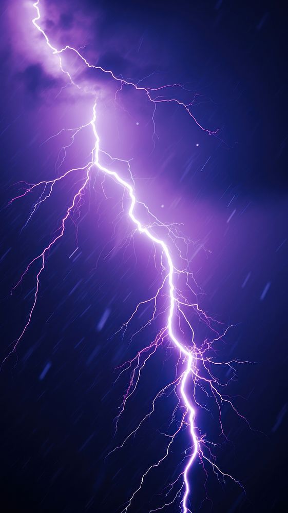  A purple lightning bolt in the dark sky thunderstorm backgrounds outdoors. AI generated Image by rawpixel.