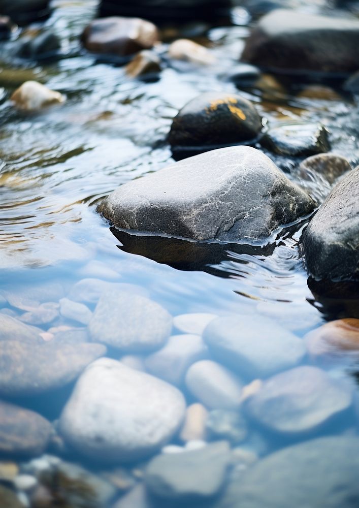  A minimal stream of water and rocks backgrounds outdoors nature. AI generated Image by rawpixel.