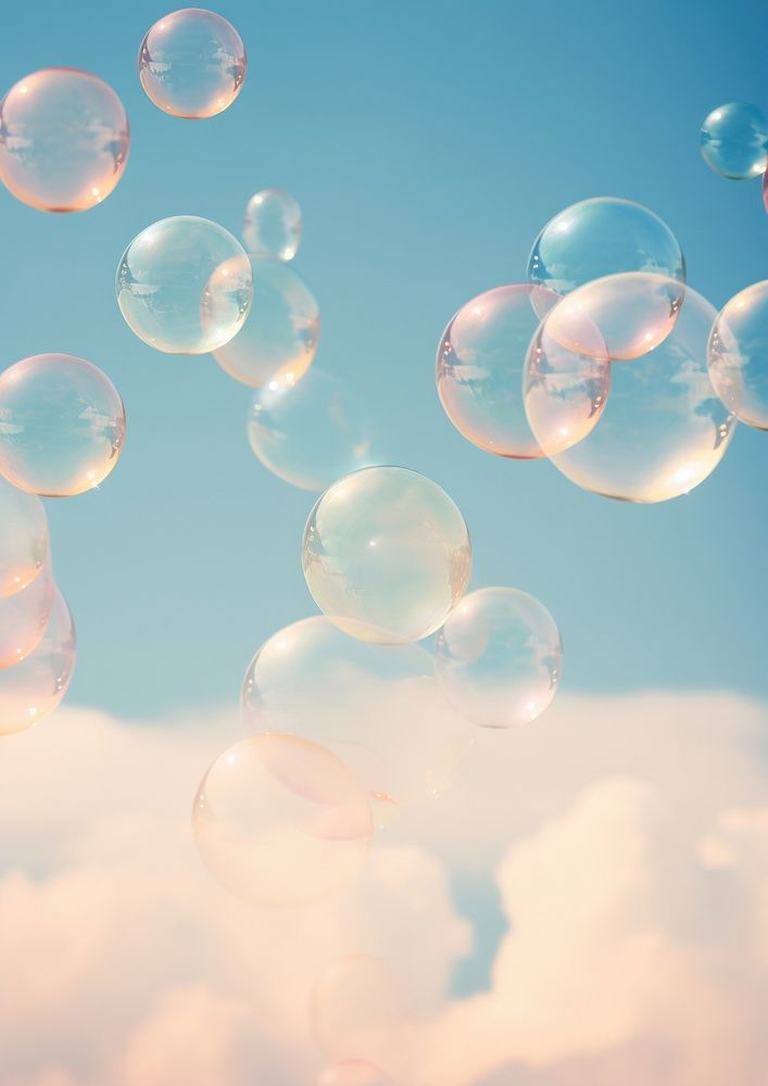 A group of soap bubbles floating in the cloud sky backgrounds outdoors balloon.