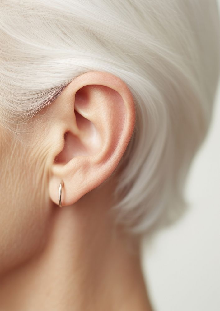 A elderly woman ear jewelry earring adult.
