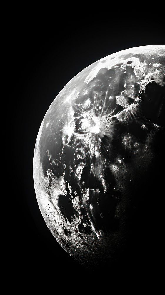 A black and white photo of the moon astronomy outdoors planet.