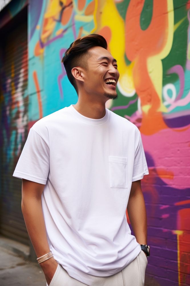 Asian American man wearing white t-shirt sleeve smile adult.