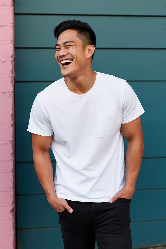 Asian American man wearing white t-shirt laughing smile adult.