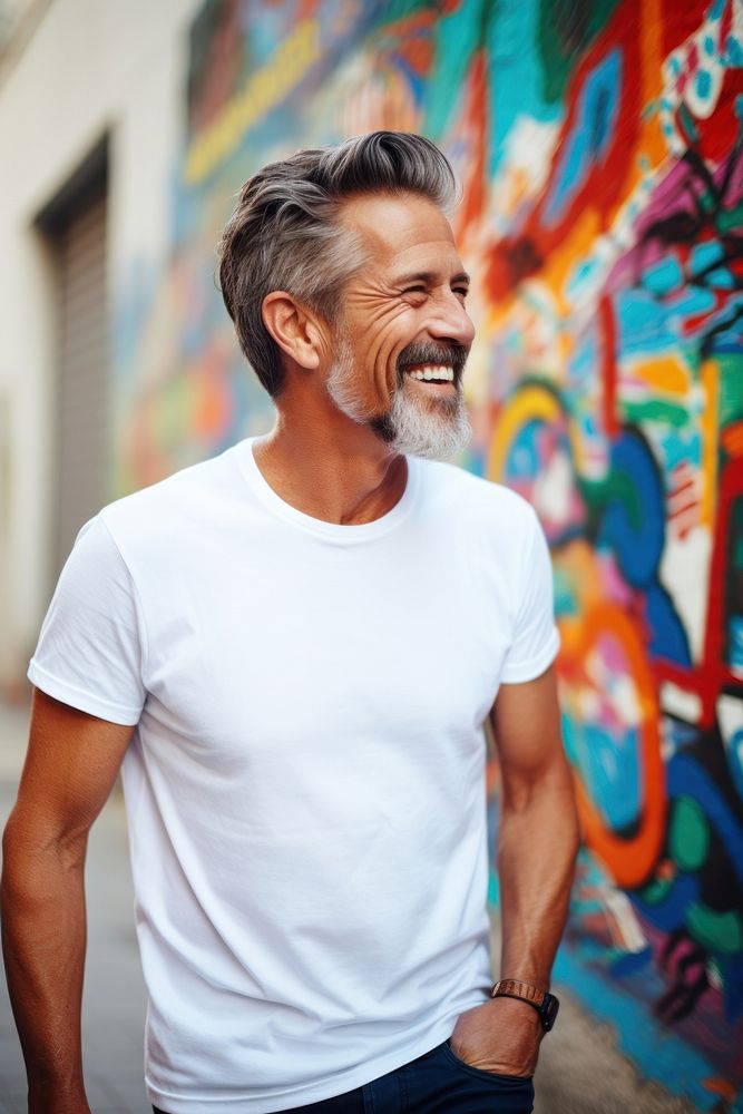 Happy american middle age man wearing white t-shirt laughing adult smile.