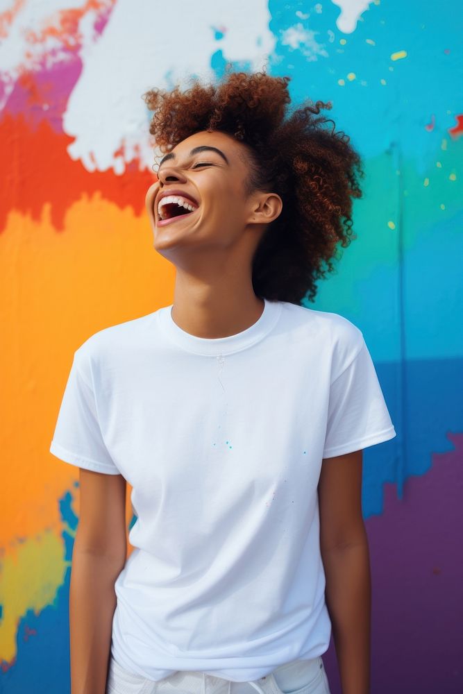 Woman wearing white t-shirt laughing adult fun.