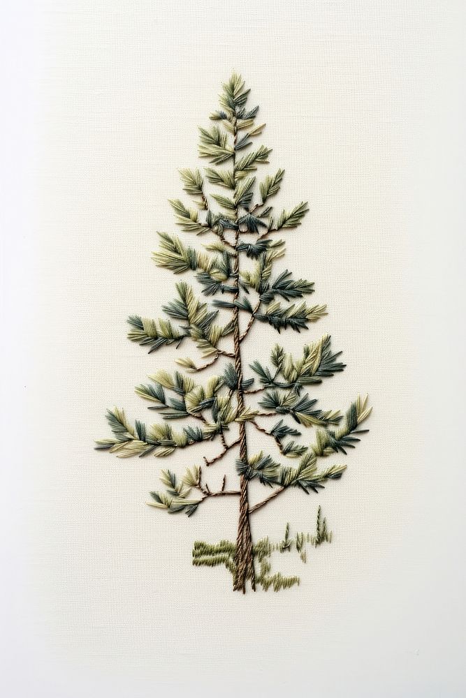 Embroidery white fabric pine tree christmas.