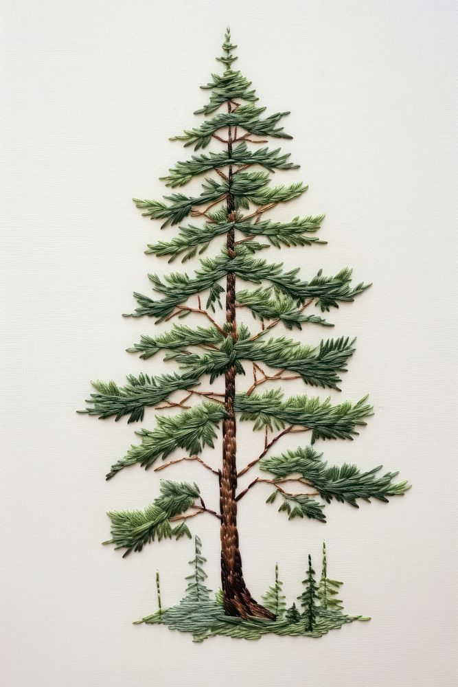 White fabric embroidery pine tree plant.