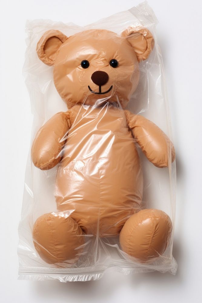 Plastic wrapping over a teddy bear toy white background representation.