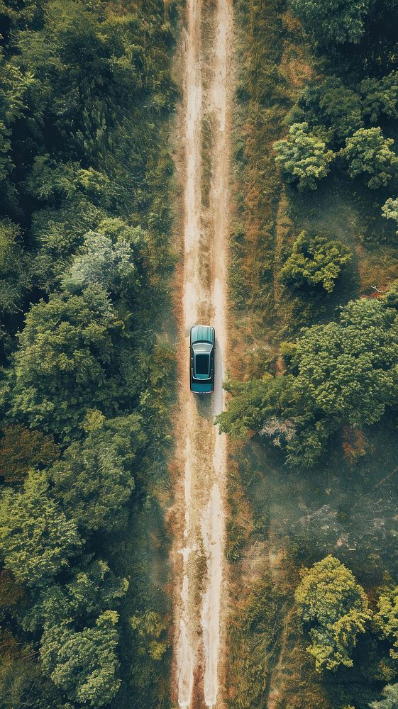 Aerial top down view of Car driving in country road landscape outdoors vehicle.