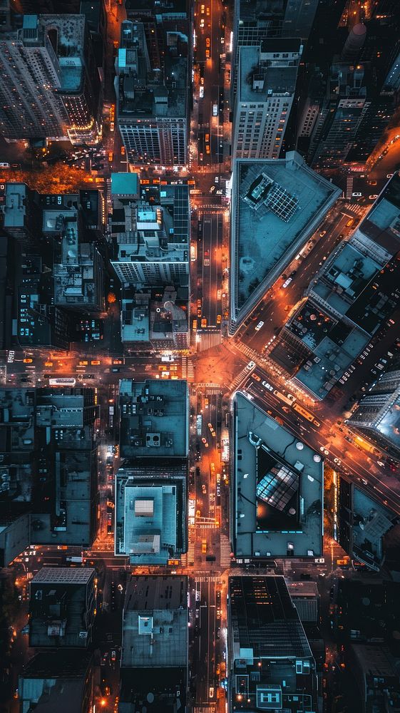 Aerial top down view of night town architecture cityscape outdoors.