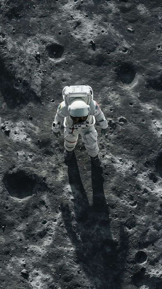 Aerial top down view of Space man walking on moon space astronomy outdoors.