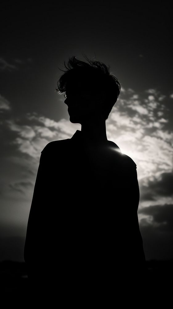 Photography boy silhouette backlighting monochrome sunset.