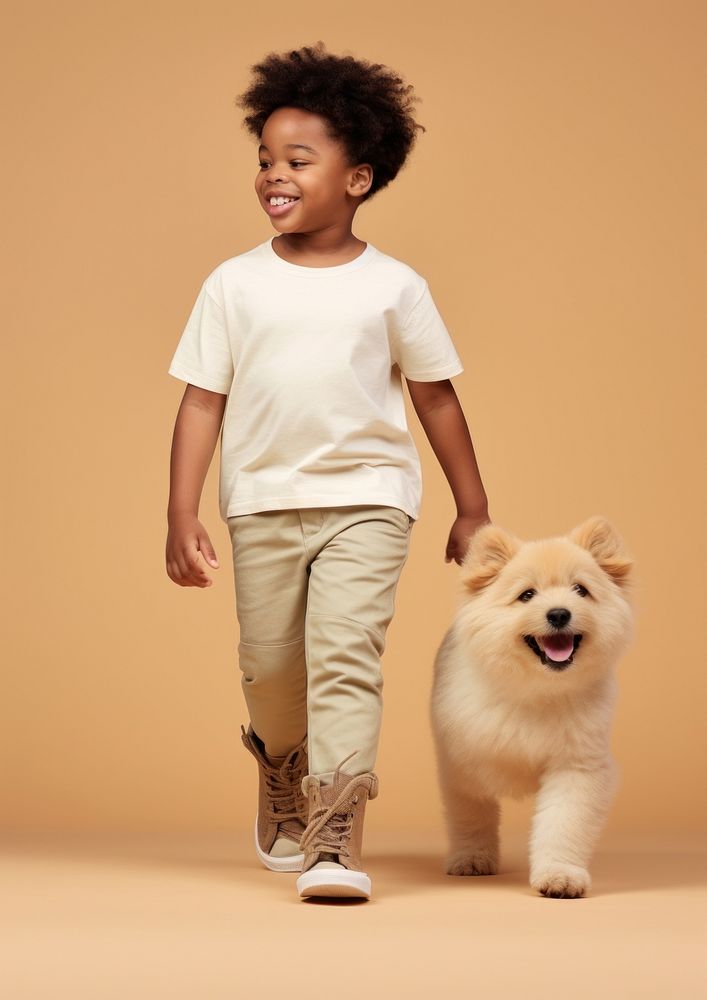 Cream shirt and pant  pet footwear mammal.