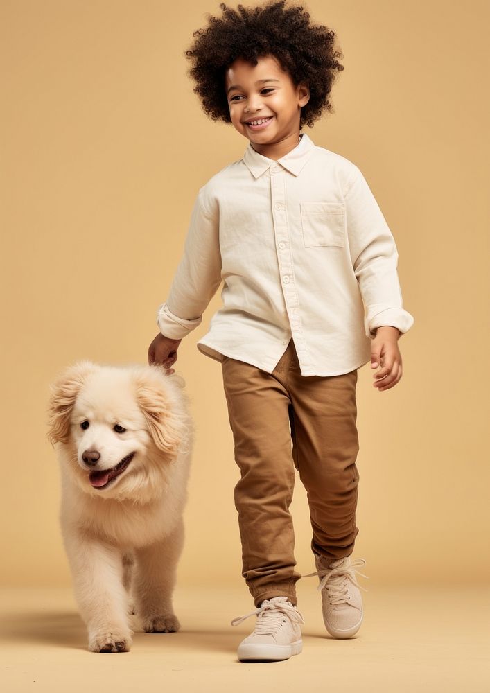 Cream shirt and pant  pet footwear mammal.