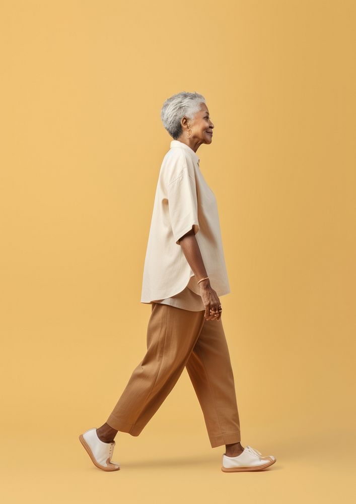 Cream shirt and pant  standing walking person.