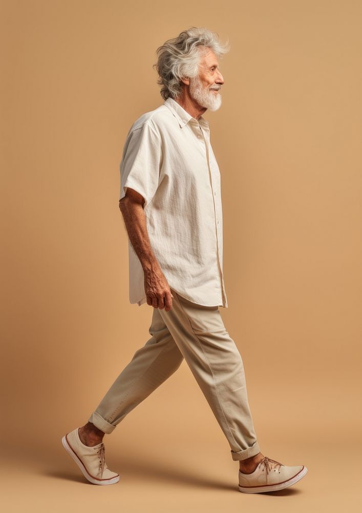 Cream shirt and pant  footwear walking person.