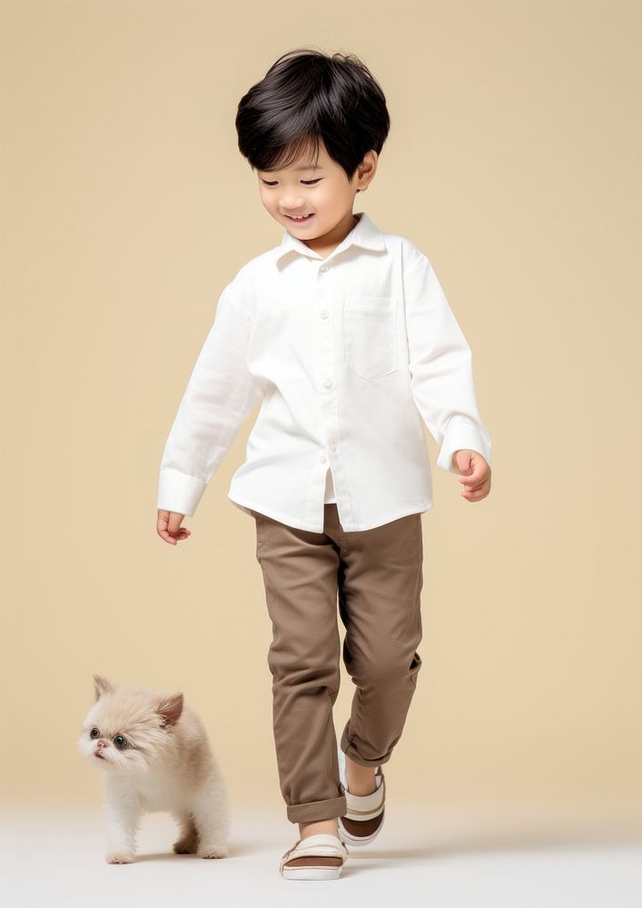Cream shirt and pant  pet portrait mammal.