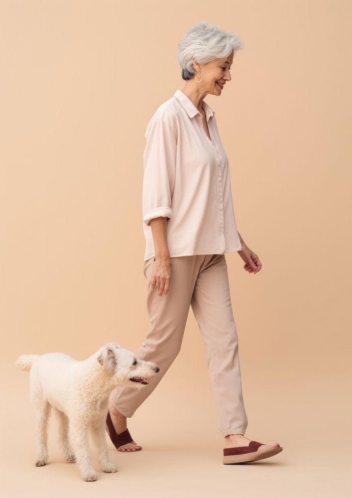 Cream shirt and pant  walking pet animal.