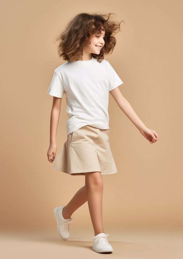 Cream t-shirt and skirt  miniskirt shorts person.