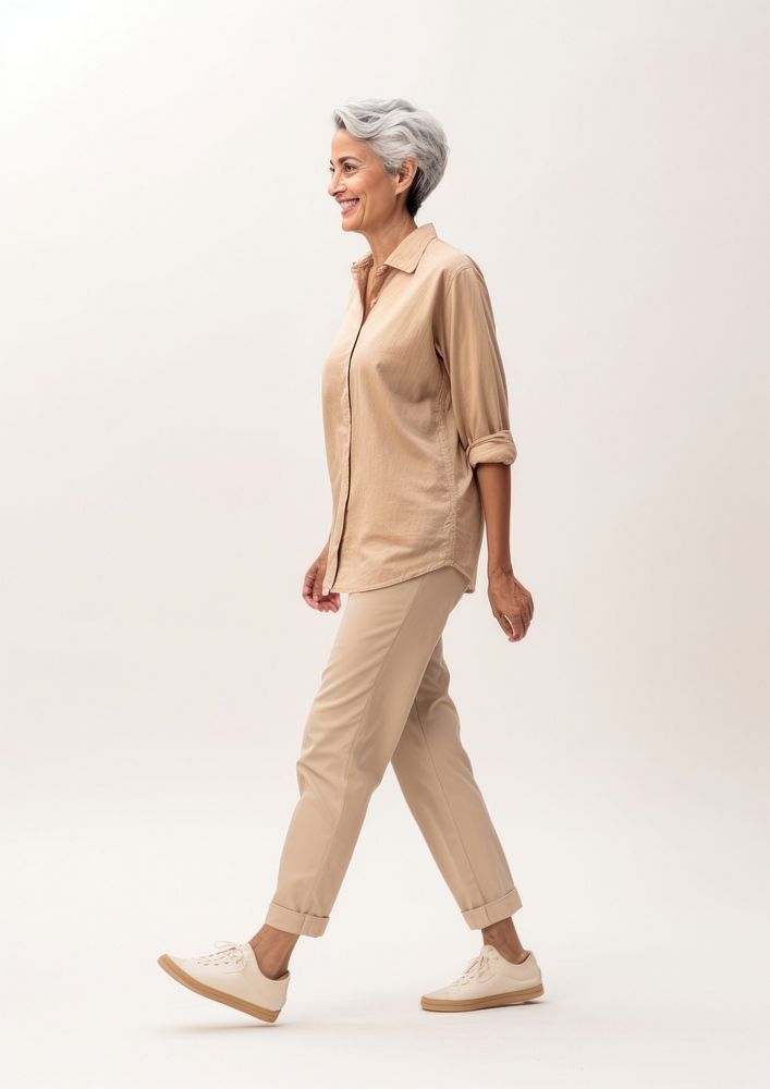 Cream shirt and pant  walking person adult.