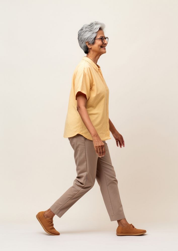 Cream shirt and pant  walking person adult.