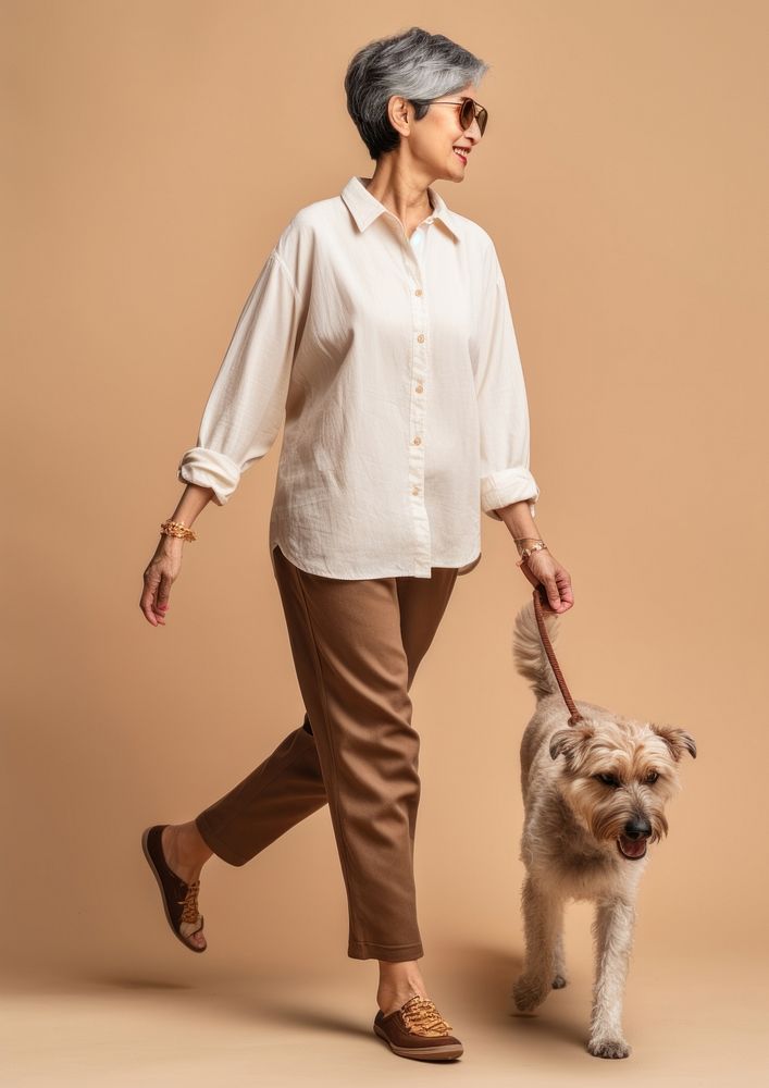 Cream shirt and pant  dog footwear walking.