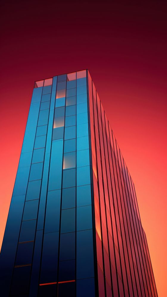 Bold color minimal skyscraper architecture building evening.