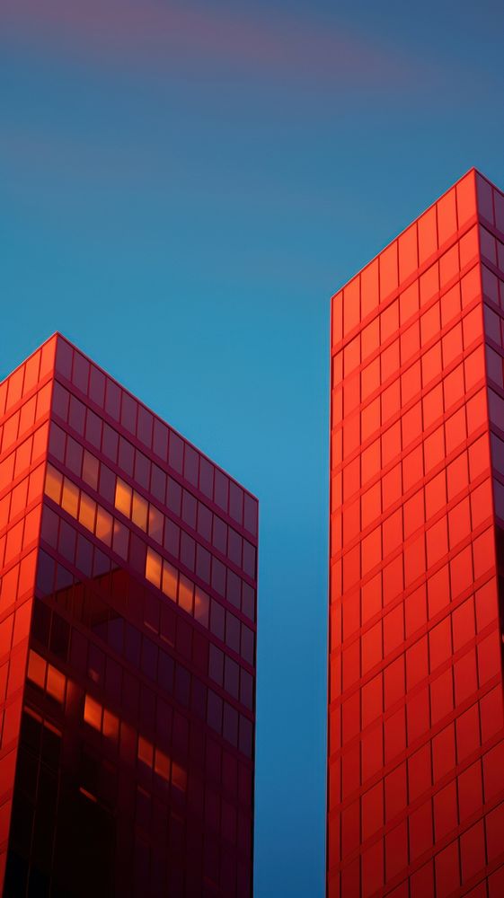 Bold color twin minimal skyscrapers architecture building outdoors.