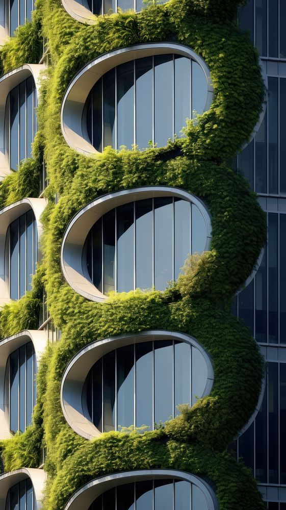 Curve contemporary skyscraper facade bushes architecture building outdoors.